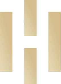 A logo featuring a stylized gold letter "H" on a transparent background. The letter is formed by three vertical gold bars of equal width and height, interrupted by a horizontal gold bar in the middle. The overall design has a sleek and modern appearance, perfect for businesses like Door Installation Buchanan County.